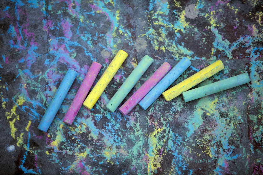 Yellow, pink, green and blue PAK chalk sticks